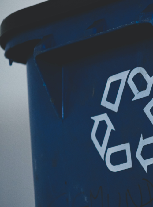 recycling bin with chasing arrows symbol