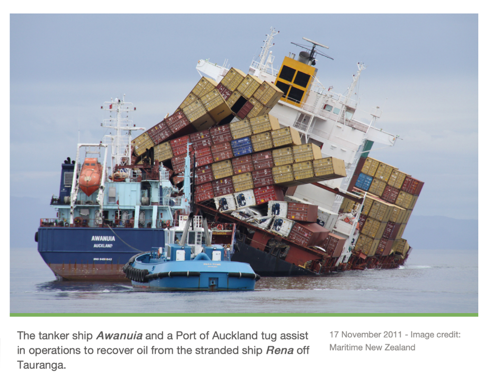 The tanker ship Awanuia and a Port of Auckland tug assist in operations to recover  oil from the stranded ship Rena of Tauranga.