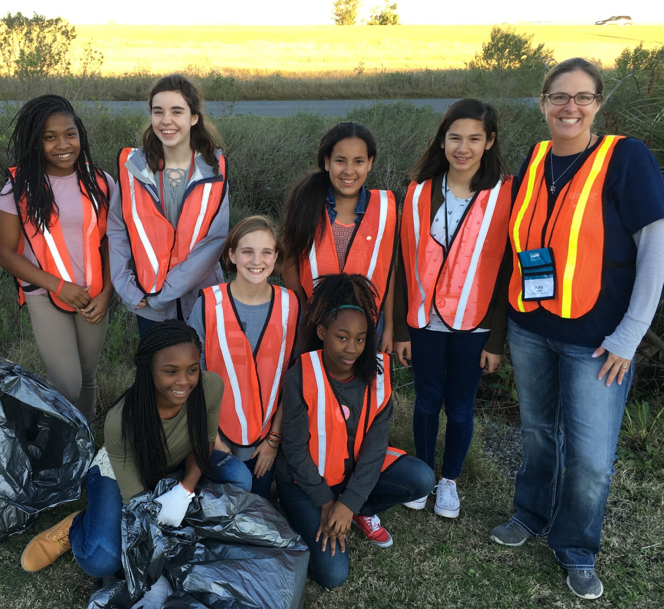 Smith leads Glynn Middle School's 2017 Salt Marsh Soldiers in a marine debris cleanup around the school